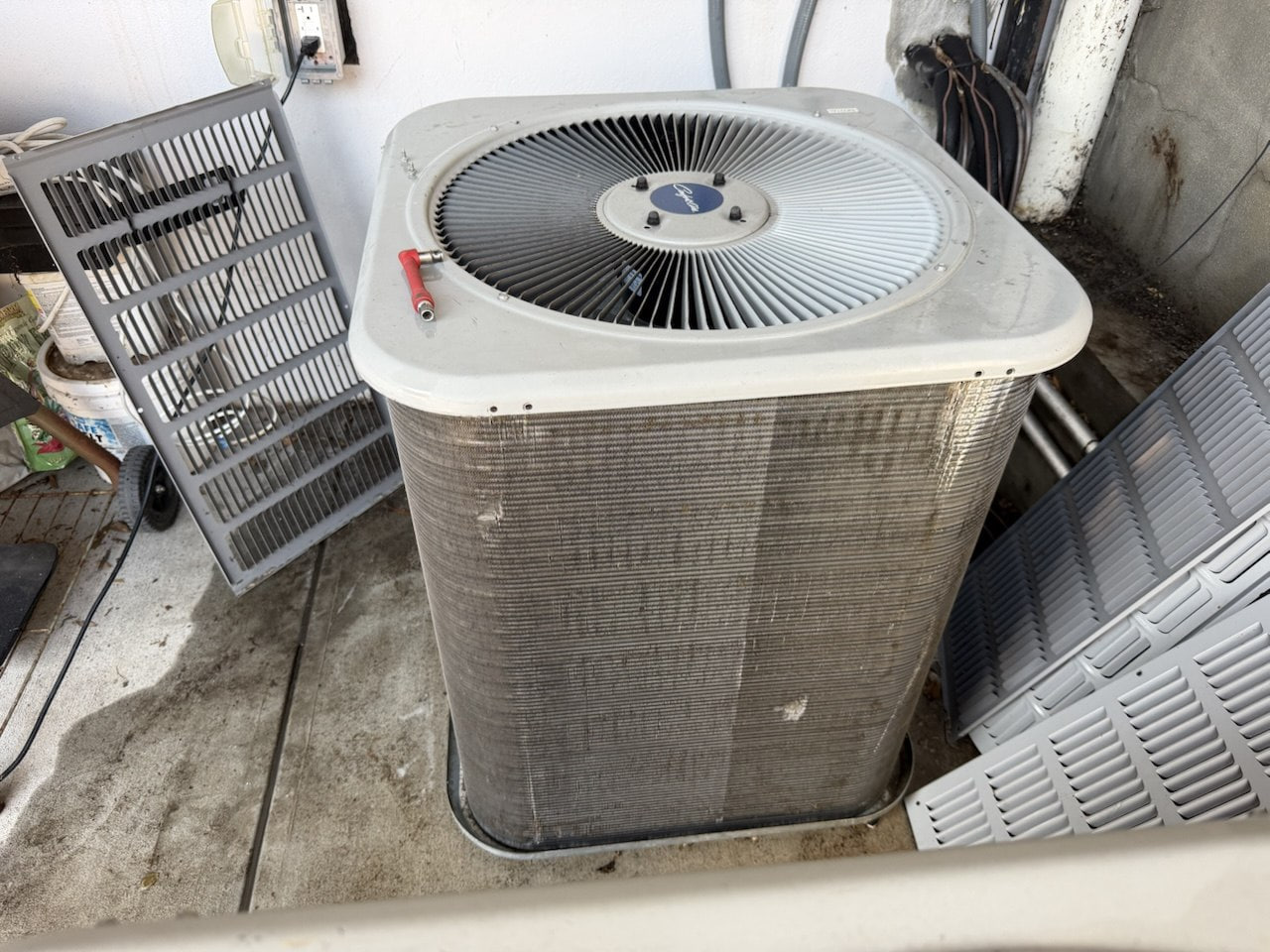 Outdoor AC condenser cleaning by Midnight Air
